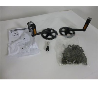 Two black bicycle cranksets with orange pedals, a bag of chain, a small tool, and instruction sheets on a white surface.